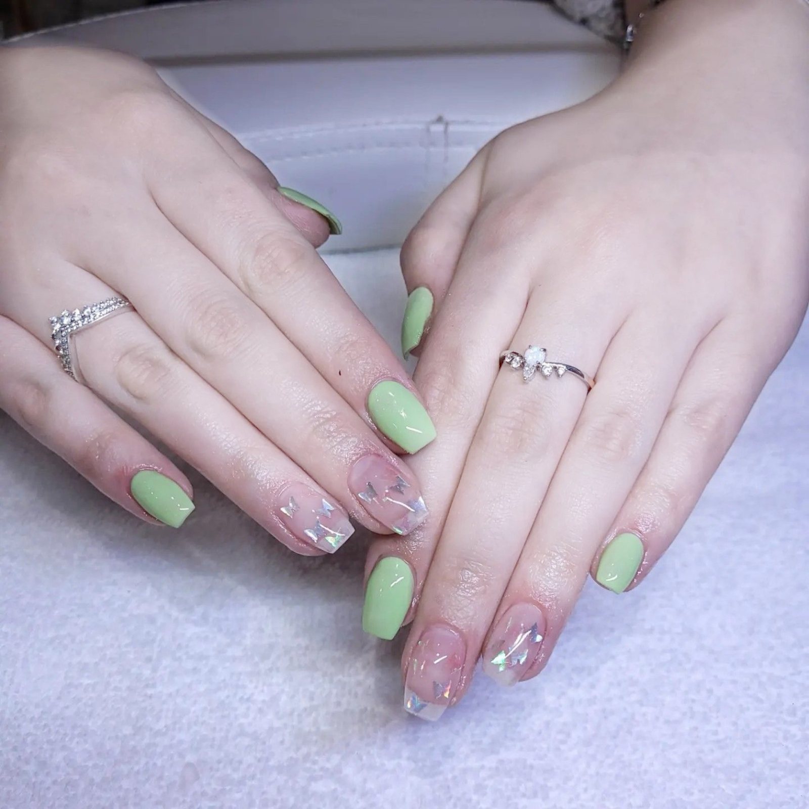Green and butterfly nail set by Ozy Nails